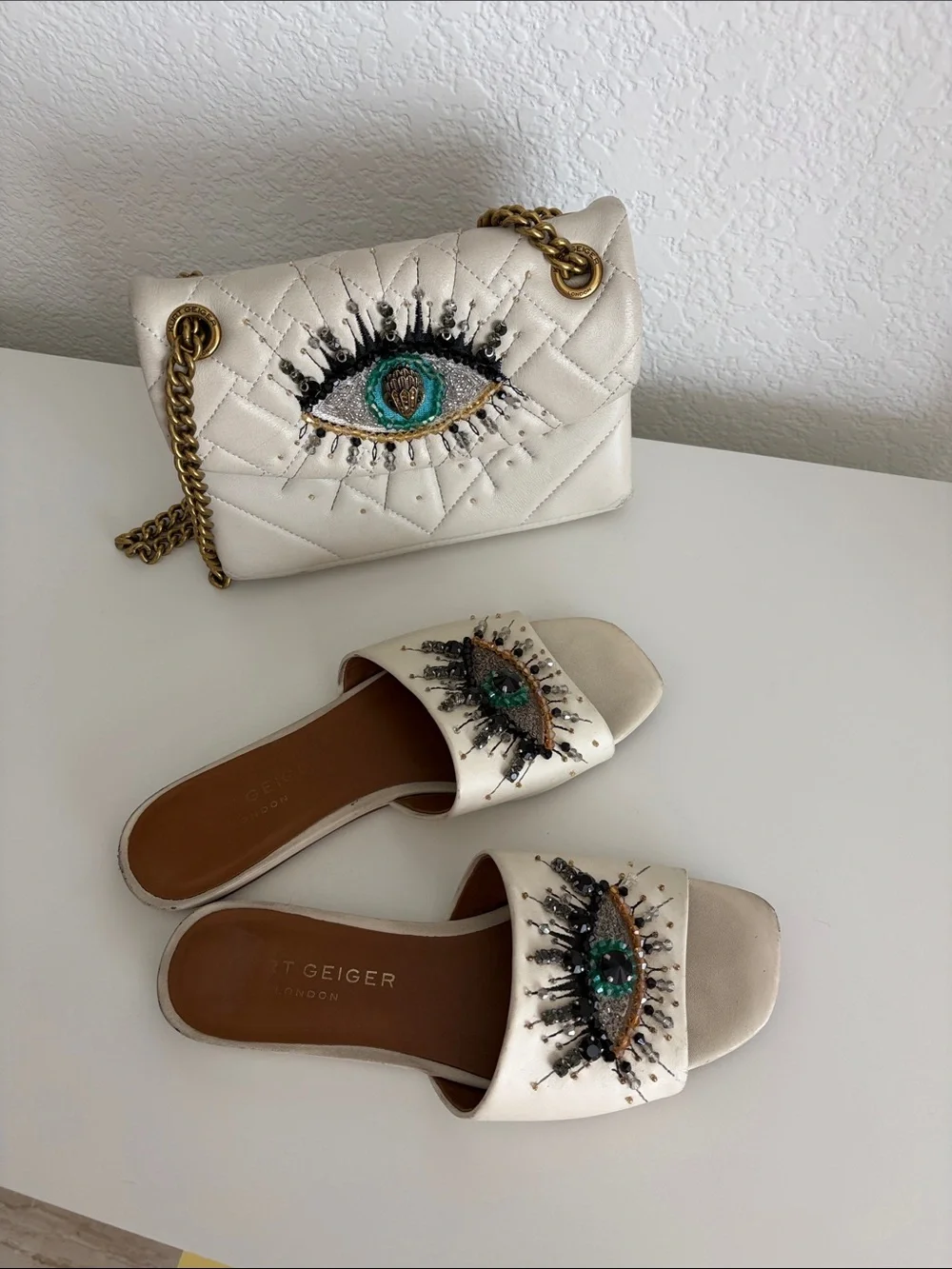 Kurt Geiger Quilted Eye-Embellished Chain Shoulder Bag with Matching Slides - Picture 1 of 1